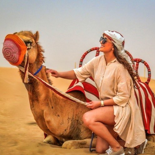 Camel Riding in Desert